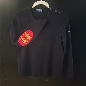 Saint James Black Sweater with Red and Gold Lion Patch